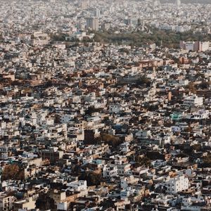 Preview wallpaper buildings, city, roofs, aerial view