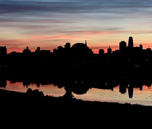 Preview wallpaper buildings, city, silhouettes, river, evening