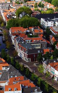 Preview wallpaper buildings, city, streets, roofs