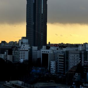 Preview wallpaper buildings, city, tower, sunrise