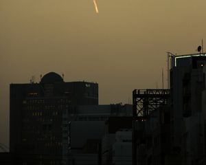 Preview wallpaper buildings, city, twilight, sky, glow