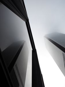 Preview wallpaper buildings, facades, bottom view, fog, black and white