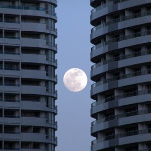 Preview wallpaper buildings, facades, moon, full moon