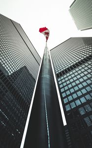 Preview wallpaper buildings, flagpole, flag, architecture, skyscrapers