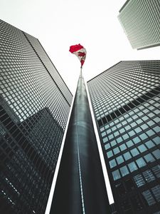 Preview wallpaper buildings, flagpole, flag, architecture, skyscrapers