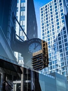 Preview wallpaper buildings, glass, windows, clocks, reflections
