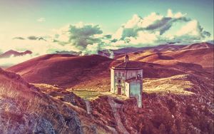 Preview wallpaper buildings, hills, desert, grass, sky