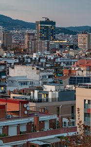 Preview wallpaper buildings, houses, lights, evening, city