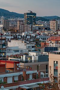 Preview wallpaper buildings, houses, lights, evening, city