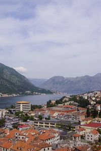 Preview wallpaper buildings, houses, mountains, river, city
