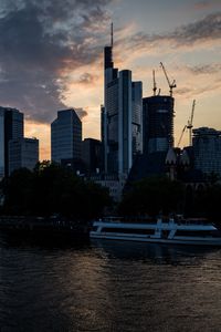 Preview wallpaper buildings, houses, river, ship, evening