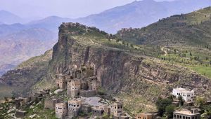 Preview wallpaper buildings, houses, rocks, cliff, mountains