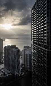 Preview wallpaper buildings, houses, sea, city, aerial view, black and white