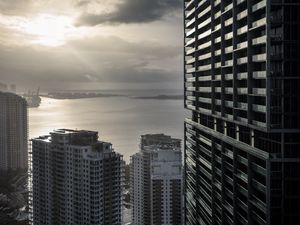 Preview wallpaper buildings, houses, sea, city, aerial view, black and white