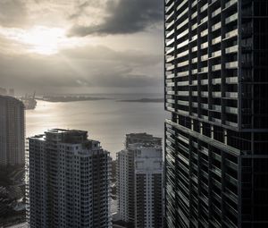 Preview wallpaper buildings, houses, sea, city, aerial view, black and white