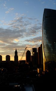 Preview wallpaper buildings, houses, silhouettes, evening, city