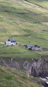 Preview wallpaper buildings, houses, slope, field, cliff