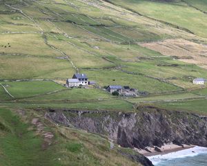 Preview wallpaper buildings, houses, slope, field, cliff