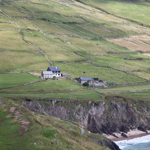 Preview wallpaper buildings, houses, slope, field, cliff