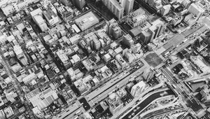 Preview wallpaper buildings, houses, streets, roads, aerial view, black and white