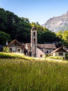 Preview wallpaper buildings, houses, tower, grass, trees, nature