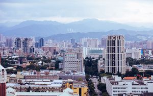 Preview wallpaper buildings, houses, trees, mountains, city