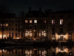 Preview wallpaper buildings, light, water, reflection, night, dark