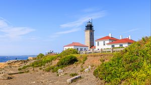 Preview wallpaper buildings, lighthouse, slope, grass, sky