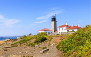 Preview wallpaper buildings, lighthouse, slope, grass, sky