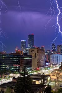 Preview wallpaper buildings, lightning, city, night, lights