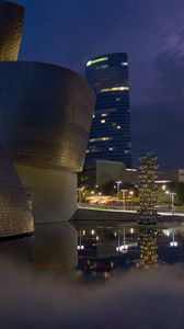 Preview wallpaper buildings, lights, architecture, evening, fog