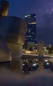 Preview wallpaper buildings, lights, architecture, evening, fog