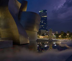 Preview wallpaper buildings, lights, architecture, evening, fog