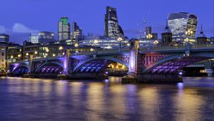 Preview wallpaper buildings, lights, city, bridge, river, evening