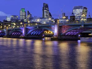 Preview wallpaper buildings, lights, city, bridge, river, evening