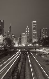 Preview wallpaper buildings, lights, city, rails, night, black and white