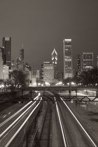 Preview wallpaper buildings, lights, city, rails, night, black and white