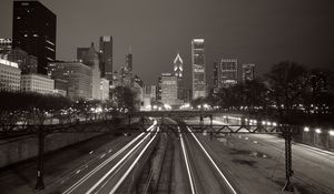 Preview wallpaper buildings, lights, city, rails, night, black and white