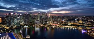 Preview wallpaper buildings, lights, lake, city, evening
