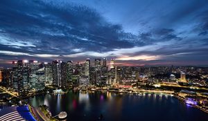 Preview wallpaper buildings, lights, lake, city, evening