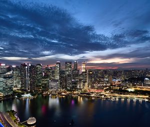 Preview wallpaper buildings, lights, lake, city, evening