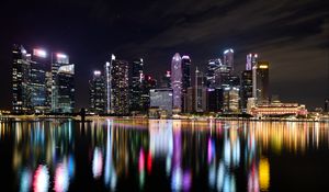 Preview wallpaper buildings, lights, river, reflection, night, city, singapore