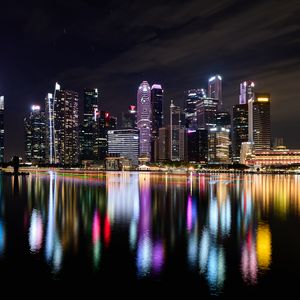 Preview wallpaper buildings, lights, river, reflection, night, city, singapore