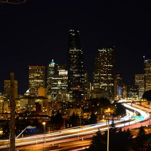 Preview wallpaper buildings, lights, road, glow, city, night