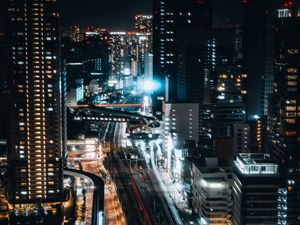 Preview wallpaper buildings, lights, road, glow, freezelight, night, city