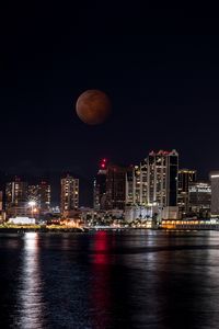 Preview wallpaper buildings, lights, sea, city, moon, full moon