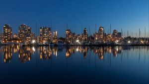 Preview wallpaper buildings, lights, yachts, pier, reflection, city