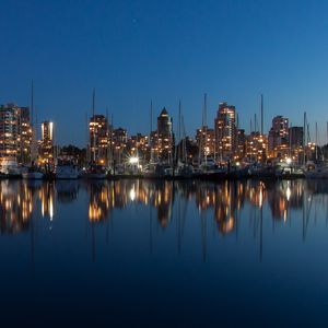 Preview wallpaper buildings, lights, yachts, pier, reflection, city
