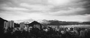 Preview wallpaper buildings, mountains, city, black and white, hong kong