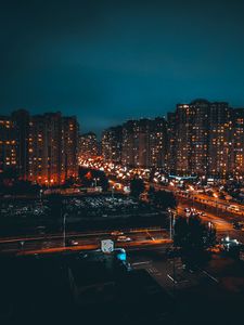 Preview wallpaper buildings, night city, road, lights, glow